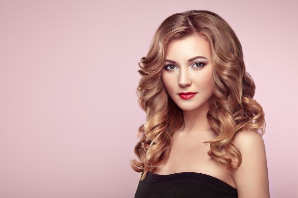 blonde-woman-with-long-shiny-wavy-hair-PCD2AGC